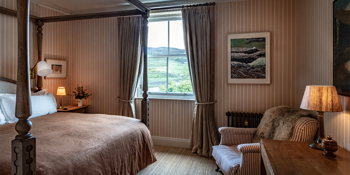 Bedroom interiors of luxury lodge at Scaliscro estate with sea views