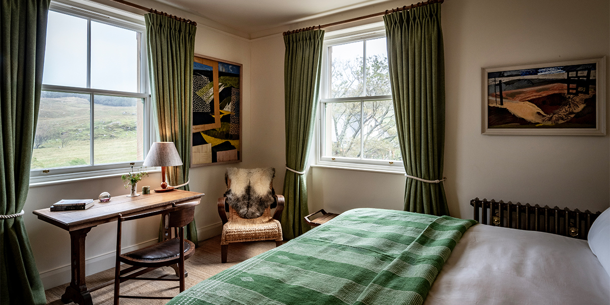 Bedroom interiors of luxury lodge at Scaliscro estate with sea views